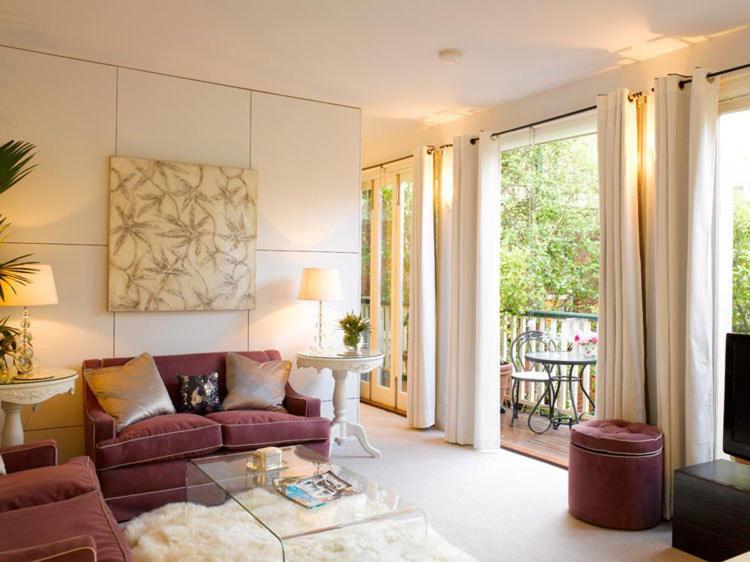 Andre'S Mews Aparthotel เมลเบิร์น ห้อง รูปภาพ